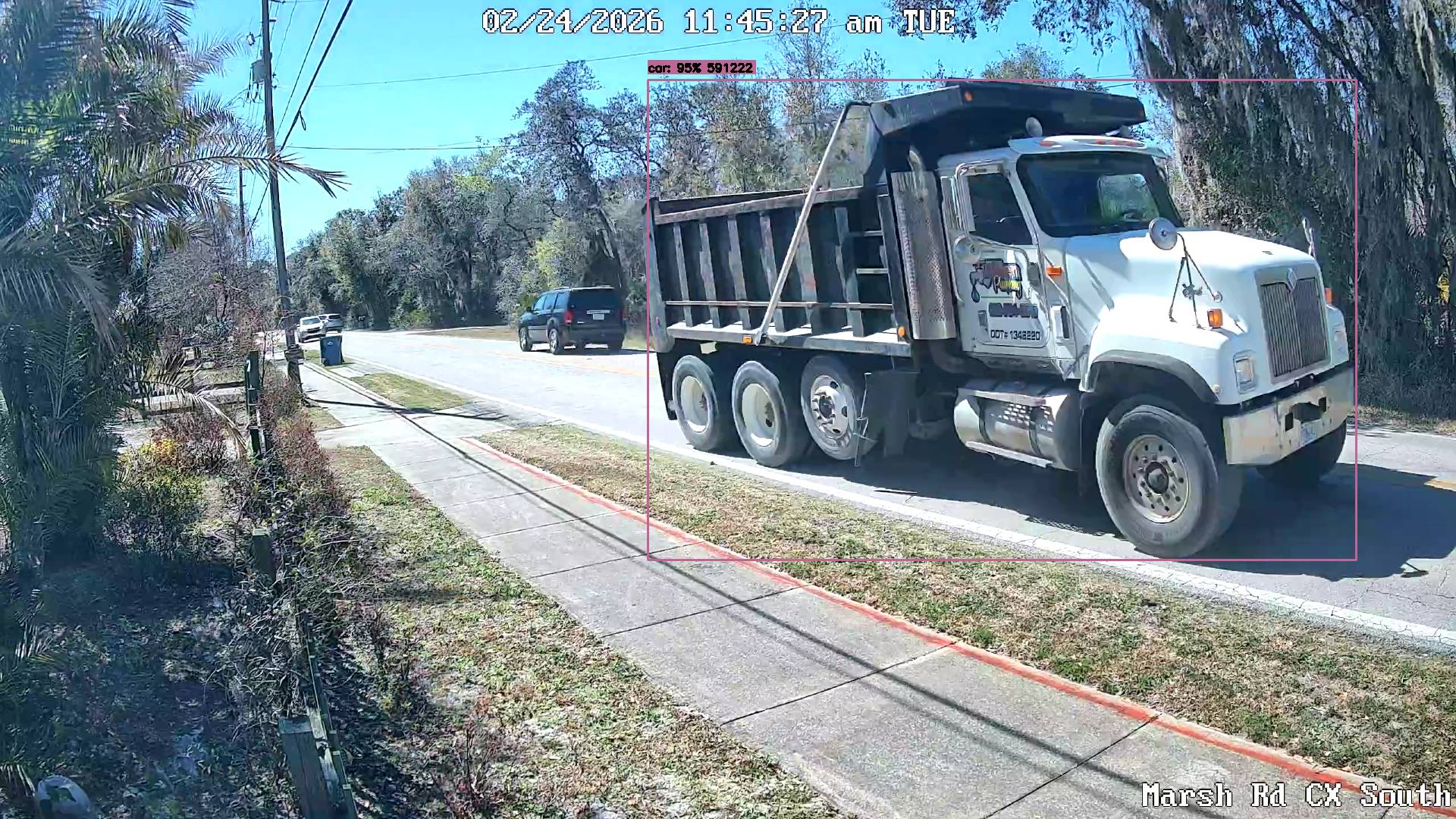 Allen Plumbing dump truck on narrow Marsh Road
